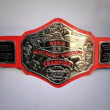 Hulk Hogan’s 1984 WWF Championship Belt with red nickel strap and bold classic design.
