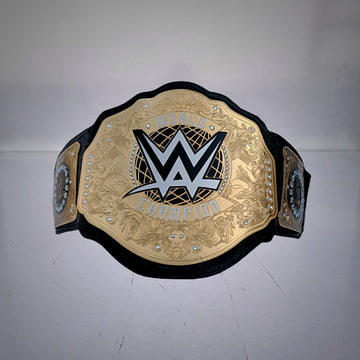 WWE World Heavyweight Championship Belt in classic gold design.