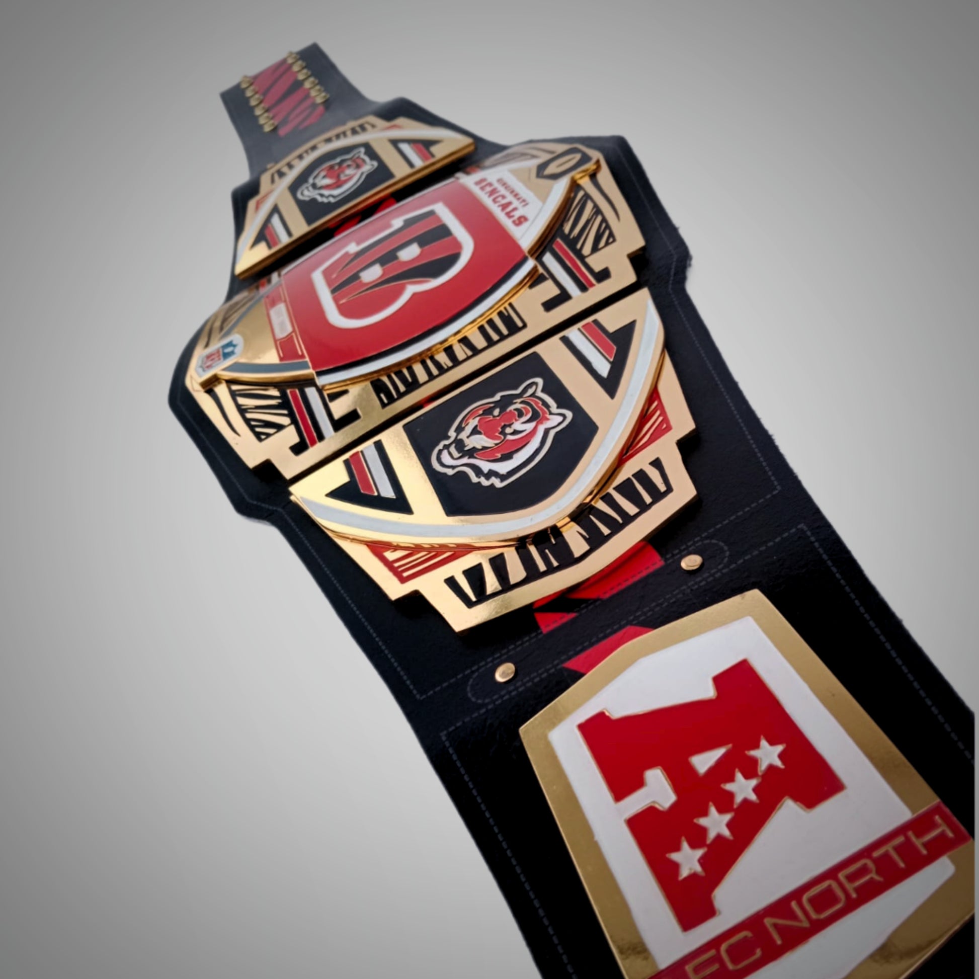 Championship belt honoring the Cincinnati Bengals, blending wrestling and football traditions.