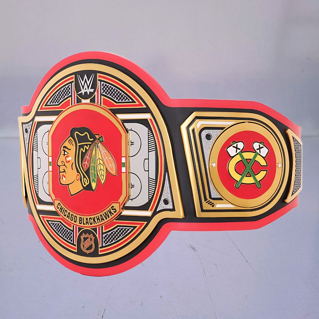 Close-up of the Chicago Blackhawks WWE Championship Belt, showcasing red, black, and white accents.