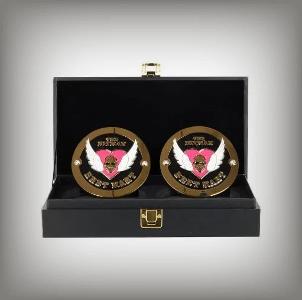 WWE championship title box set featuring Bret Hart side plates.