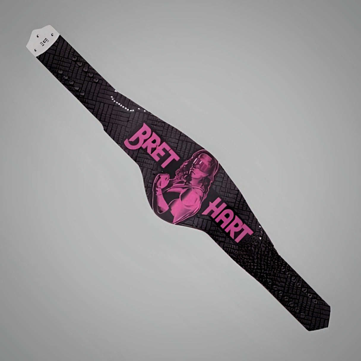 Bret Hart WWE belt featuring iconic design for collectors.