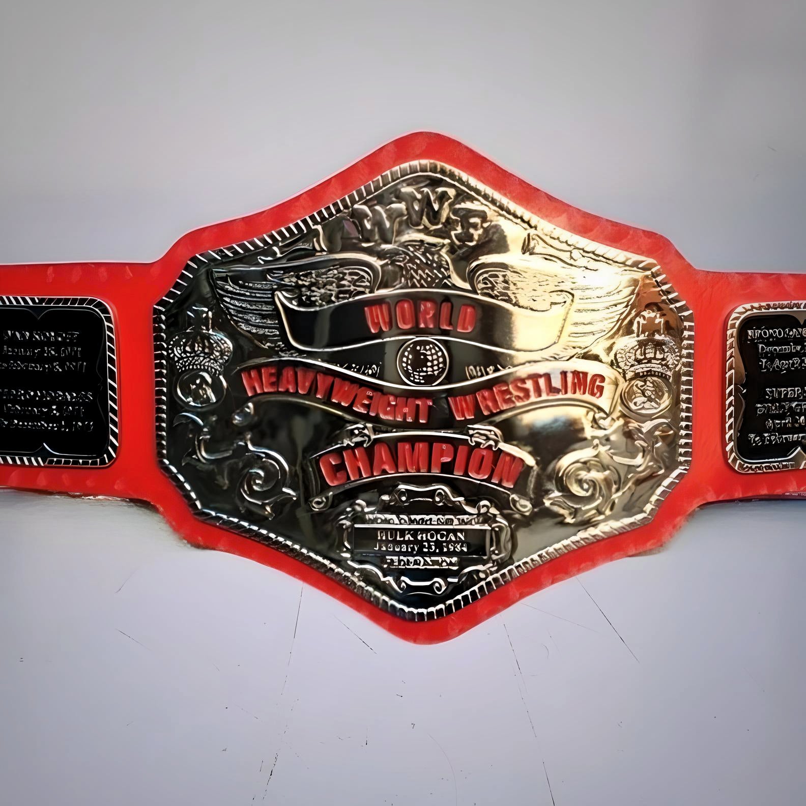 Hulk Hogan’s 1984 WWF Championship Belt with red nickel strap and bold classic design.