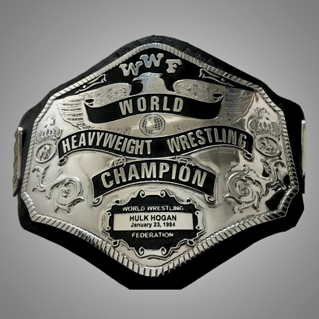 Hulk Hogan’s 1985 WWF Championship with strap and all plates displayed.
