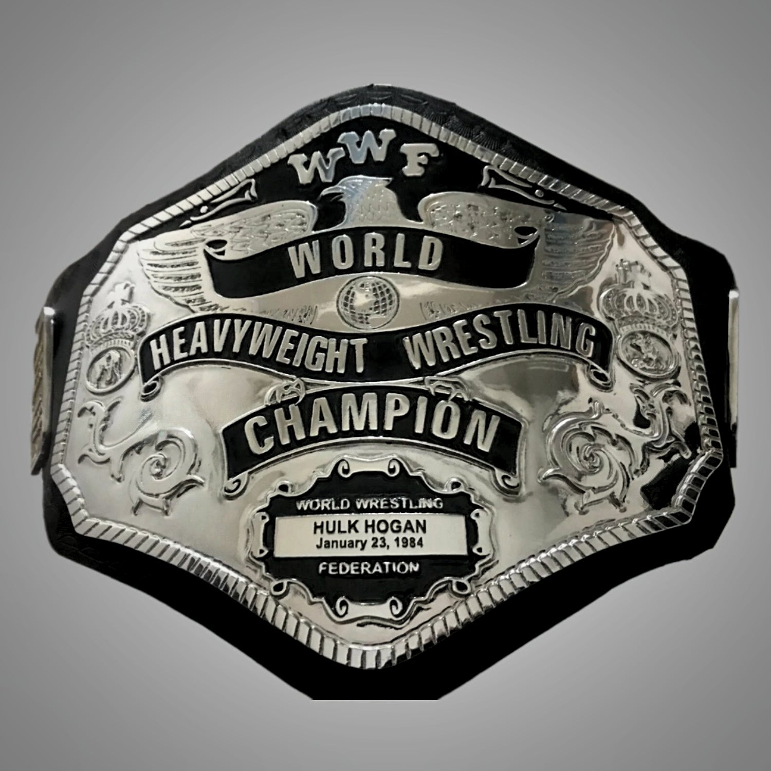 Hulk Hogan’s 1985 WWF Championship with strap and all plates displayed.