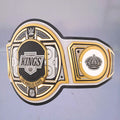 Close-up of the Los Angeles Kings WWE Championship Belt, showcasing black and silver accents.