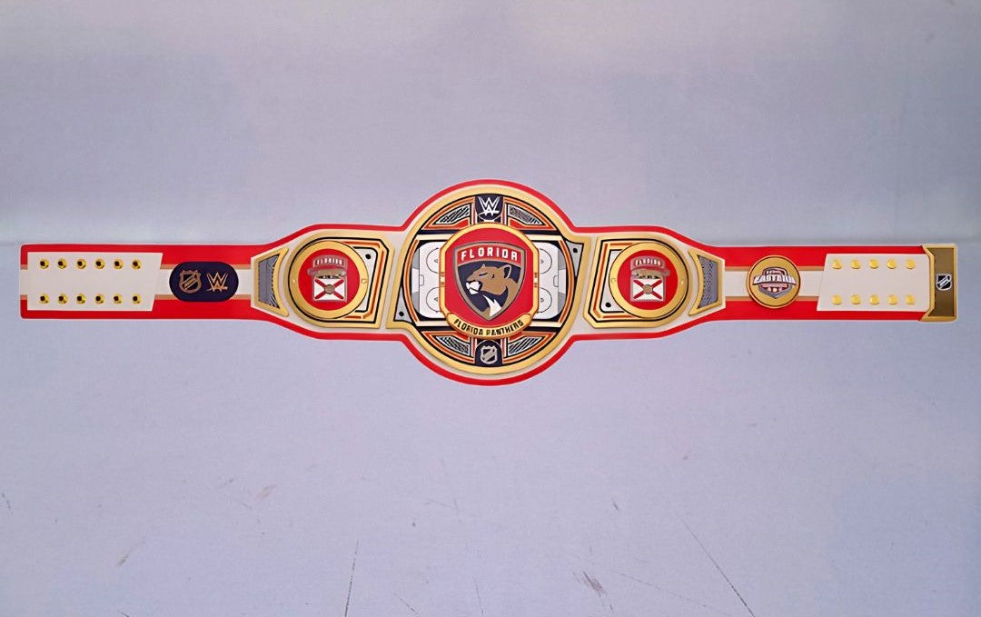 Detailed view of the Florida Panthers WWE Championship Belt, featuring embossed logos and a polished finish.