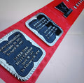 The 1984 Hulk Hogan Championship Belt featuring red strap and snap closure detail.